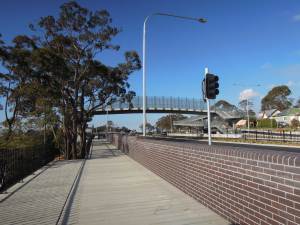 Bullaburra's "bridge to nowhere". This new bridge over the widened highway has ramps, but none were provided to access the station to the left of the photo or to cross the railway line.